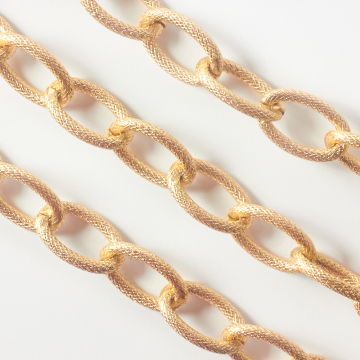 Łańcuch aluminiowy owal rowkowany złoty 30x19mm