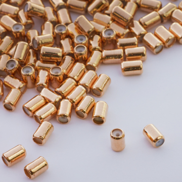 Zapięcie stoper z silikonem do cienkich sznureczków walec złoty 5x4mm