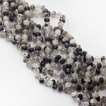 Kryształ górski z czarnym turmalinem oponka fasetowana 7x5mm