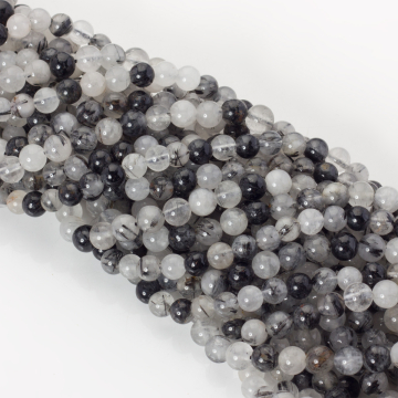 Kryształ górski z czarnym turmalinem kulka gładka 6mm Kryształ górski z czarnym turmalinem kulka gładka 6mm