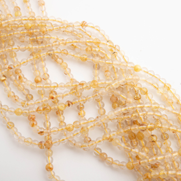 Kryształ górski z rutylem kulki gładkie 3mm - na sznury