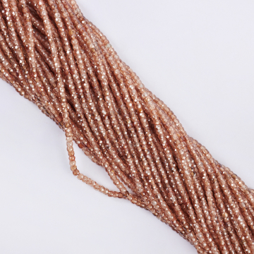 Cyrkonia oponka fasetowana 3x2mm beżowa