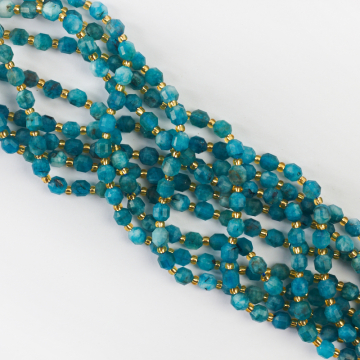 Apatyt baryłka fasetowana 6mm