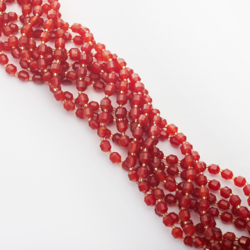 Karneol baryłka fasetowana 6mm