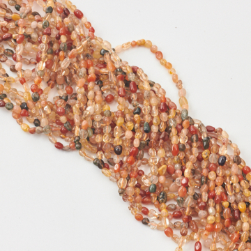 Kryształ górski z rutylem bryłki nieregularne 3x6mm