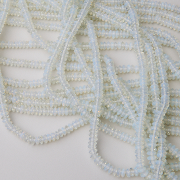 Opal syntetyczny dysk fasetowany 2x5mm