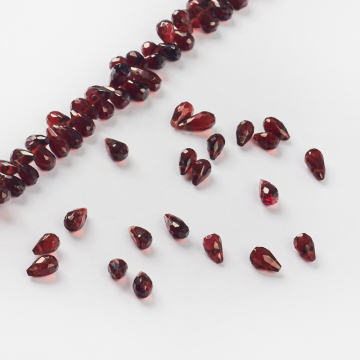 Kropla briolette fasetowana granat 5-6mm