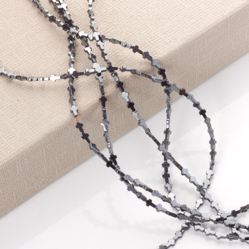 Hematyt krzyż błyszczący natural 8x6mm