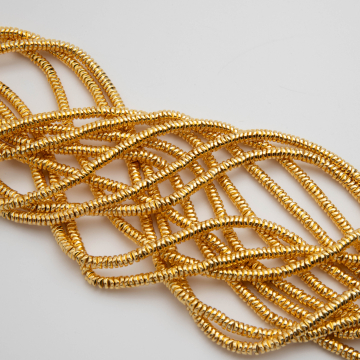 Hematyt krążek karbowany light gold 4x1,5mm PVD