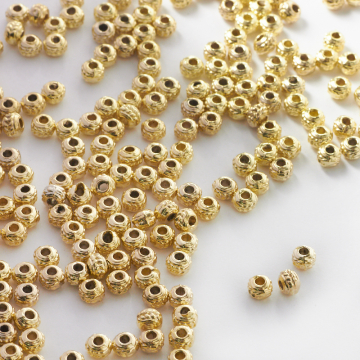 Metalowy koralik w korpeczki 4,5mm