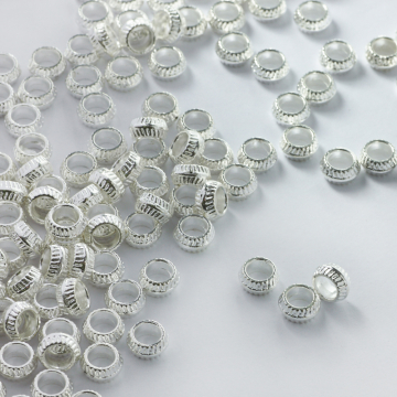 Metalowy koralik oponka z dużą dziurką 7mm