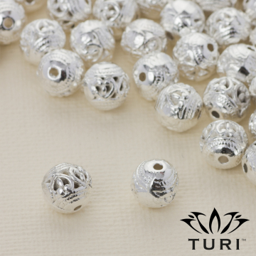 Koralik z ażurowym wzorkiem w srebrnym kolorze 8mm