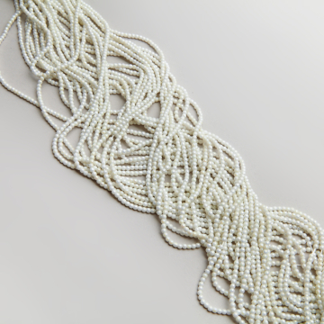 Kryształki kulki gładkie ceramic white AB 2,5mm