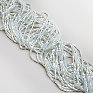 Kryształki słupki fasetowane ceramic white AB 2,5x4,5mm