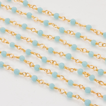 Łańcuch z kryształkami oponkami blue opal 3x4mm