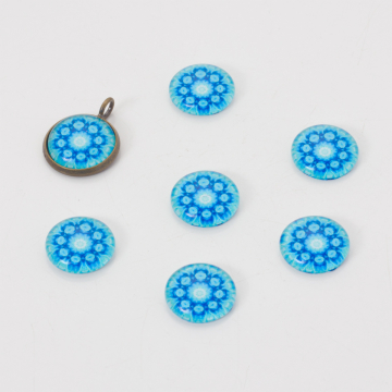 Kaboszon szklany kalejdoskop 14mm błękitny