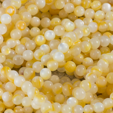 Masa perłowa kulka gładka opalizująca bananowa 6mm - na sznurze