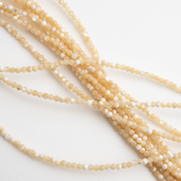 Kulki z masy perłowej opalizujące beżowe 2mm