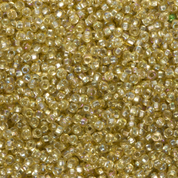 Koraliki NihBeads 12/0 Silver-Lined SH Trans-Raibnow Lt Topaz