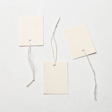 Metka z gumką do bizuterii biała 30x40mm