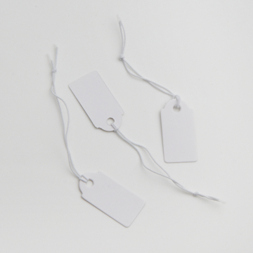 Metka z gumką do bizuterii biała 13x26mm