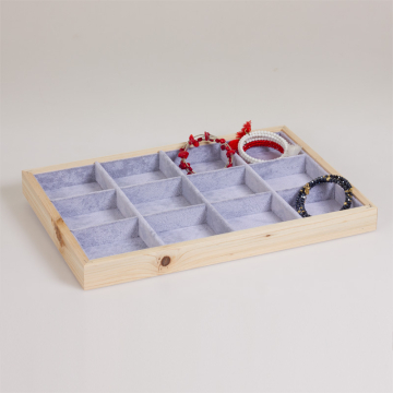 Ekspozytor drewniany 12 komorowy powlekany welurem 35x24 cm