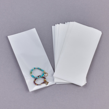 Woreczek z białym tłem 12x6cm