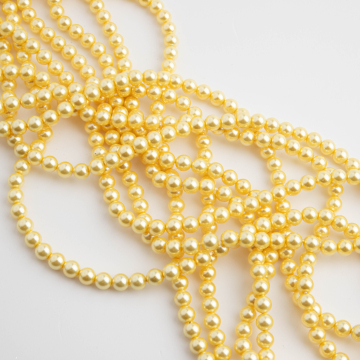 Perły seashell kulki żółte 4mm