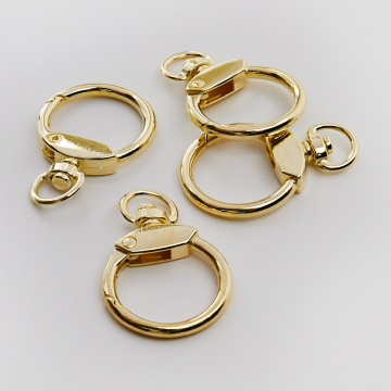 Ozdobny karabińczyk koło w kolorze złotym 4,5cm