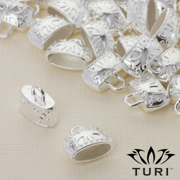 Końcówka do rzemieni ze wzorkiem w srebrnym kolorze 11x4.5mm