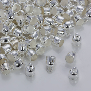 Rowkowane końcówki do rzemieni i sznurków beczułki w srebrnym kolorze 5,5mm