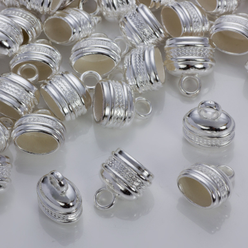 Podłużne końcówki z falkami do rzemieni w srebrnym kolorze 17x12mm