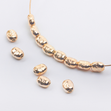 Srebrna przekładka oliwka młotkowana AG925 pozłacana 4,5x7mm