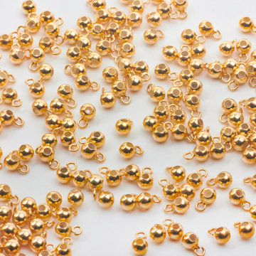 Srebrny stoper z silikonem z kółeczkiem AG925 pozłacany 4mm