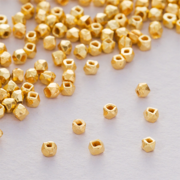 Srebrny koralik ścinany satynowy AG925 pozłacany 2x2.5mm