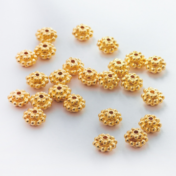 Srebrny koralik w kropeczki AG925  pozłacany6,5mm