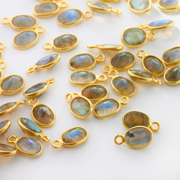 Labradoryt owal fasetowany w okuciu zawieszka AG925 7mm