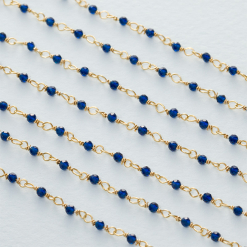 Łańcuch srebrny AG925 pozłacany ze spinelem niebieskim fasetowanym 2mm
