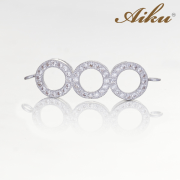 Przekładka rodowana z cyrkoniami trzy kółka dwa oczka 35x10mm