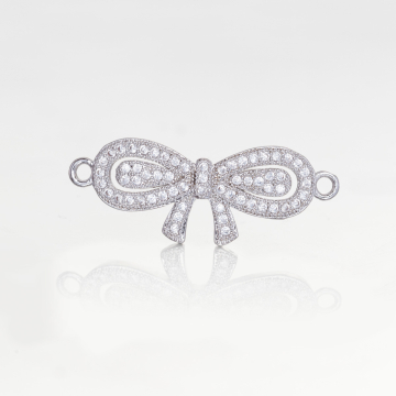 Przekładka rodowana z cyrkoniami kokardka 30x12mm