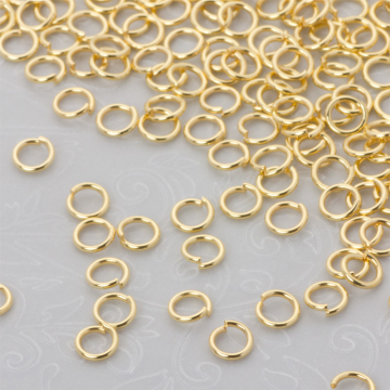 Kółeczka zaciskowe ze stali chirurgicznej w kolorze złotym 5x0,8mm PVD