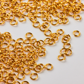 Kółeczka ze stali chirurgicznej zaciskowe pozłacane 5x0,9mm PVD Kółeczka ze stali chirurgicznej zaciskowe pozłacane 5x0,9mm PVD