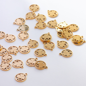 Zawieszka ze stali chirurgicznej koniczynka w kółku w kolorze złotym 12,5mm