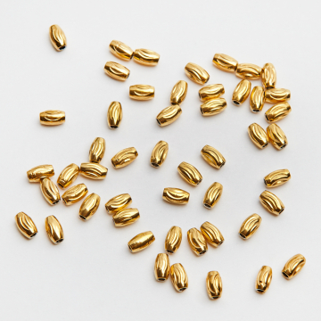 Przekładka oliwka nacinana ze stali chirurgicznej w kolorze złotym 3x5mm