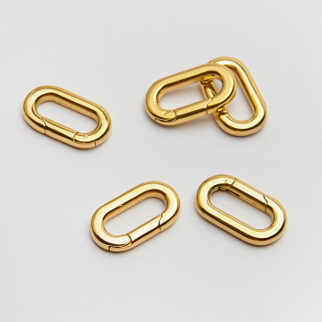 Zapięcie ozdobne owal ze stali chirurgicznej w kolorze złotym 10x18mm