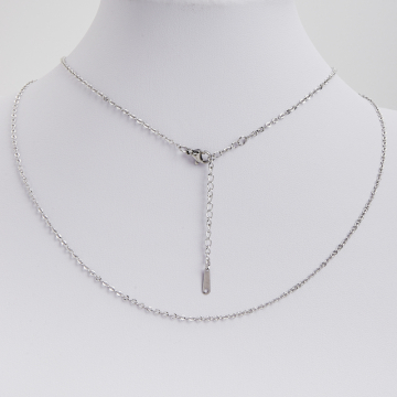 Łańcuszek ze stali chirurgicznej płaskie mini owale karbowane w kolorze srebrnym 50cm