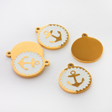 Zawieszka emaliowana kółko ze stali chirurgicznej w kolorze złotym kotwica biała 13mm