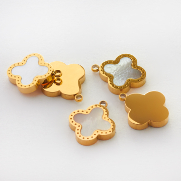 Zawieszka ze stali chirurgicznej z masą perłową koniczyna marokańska z kropeczkami w kolorze złotym 15mm