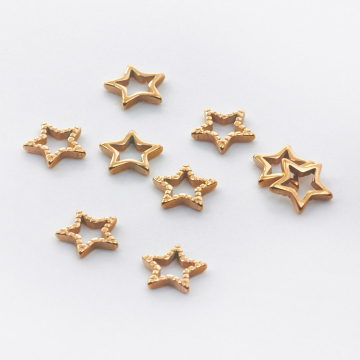 Zawieszka ze stali chirurgicznej gwiazdka w kolorze złotym 7mm