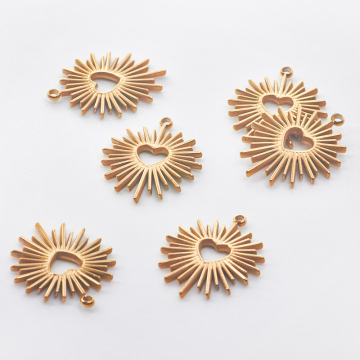 Zawieszka ze stali chirurgicznej serce z promieniami w kolorze złotym 22,5mm